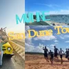 Panoramic view of the striking Mui Ne sand dunes, showcasing their unique desert-like landscape.