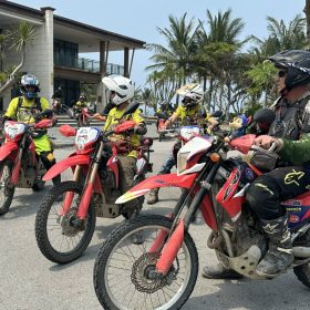 Riders with motorcycles on a 30-Day Saigon to Hanoi Motorcycle Tour